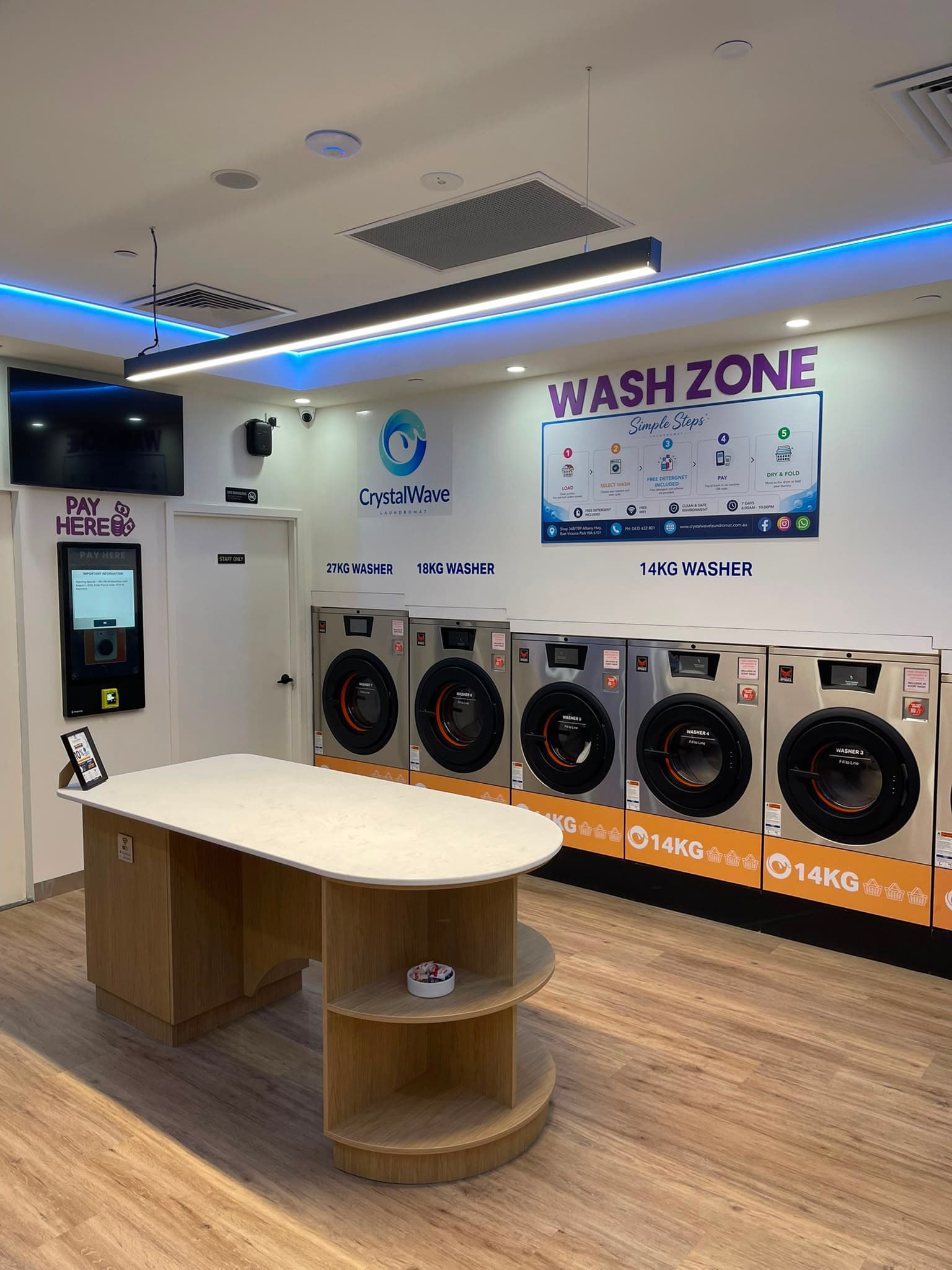 Crystal Wave laundromat interior view 4